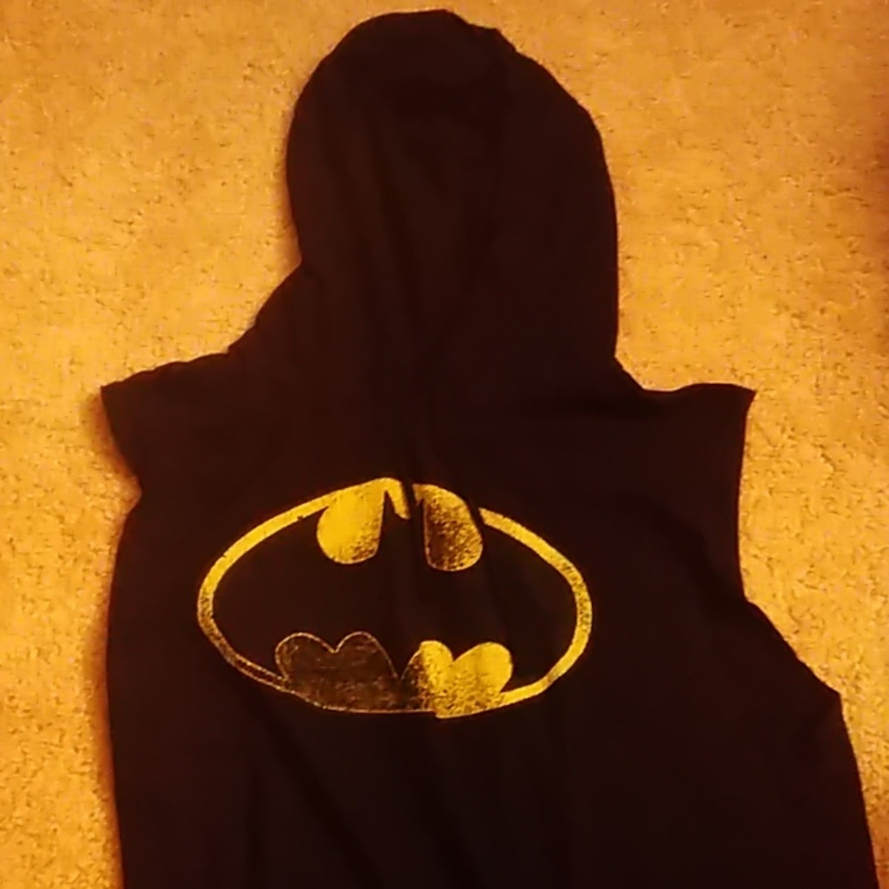 A sleeveless, hooded tank top